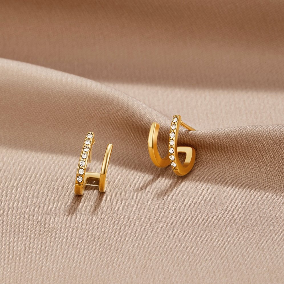 Zendaya – Ohrringe in Krallenform aus 18K Gold mit Kristallen