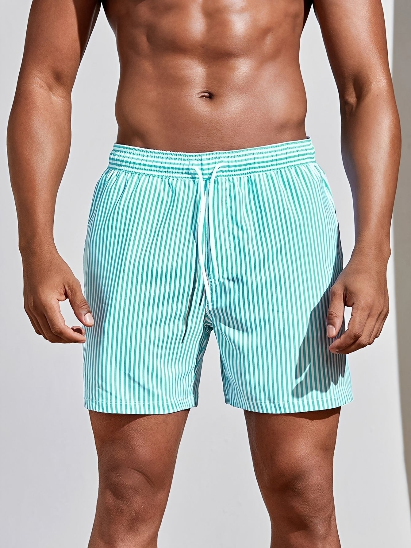 Reuben - Gestreifte schnell trocknende Badeshorts