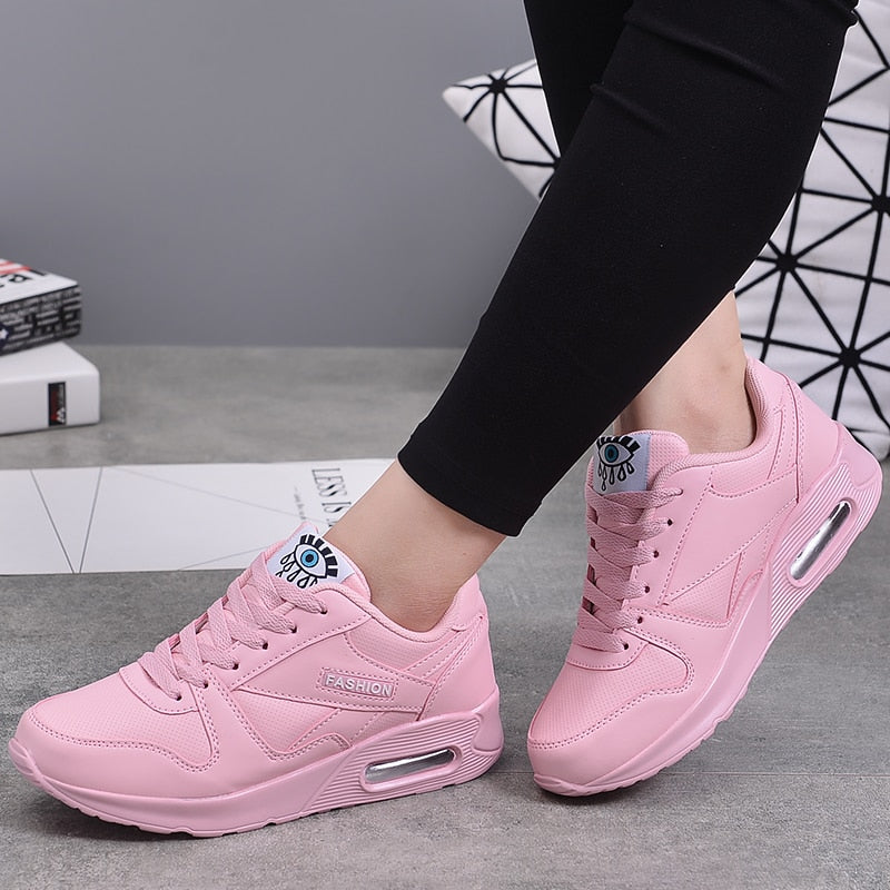 Damenschuhe Sneakers mit Luftpolstersohle und Augengesicht-Motiv